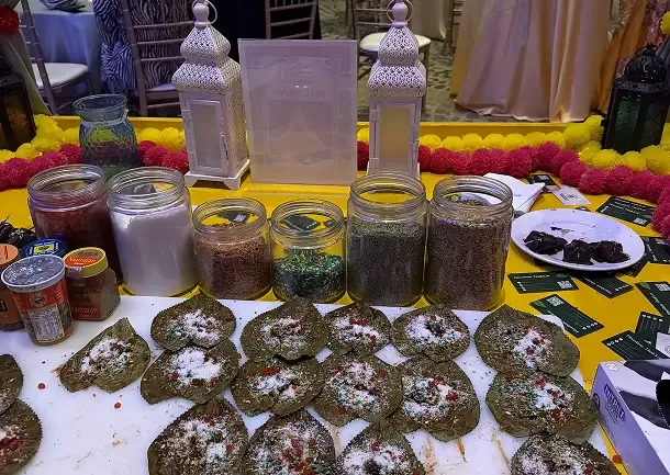 A spread of paan, masalas and sweets laid out on the counter
