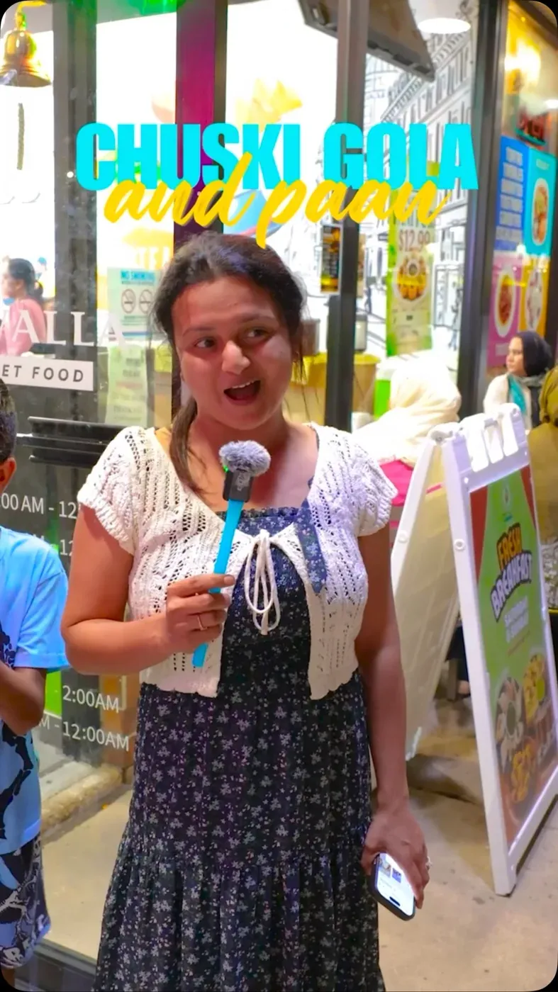 A guest singing at karaoke night